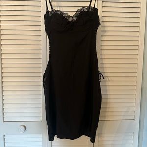 This is the Hazel Cut Out Mini Dress Black from Princess Polly.